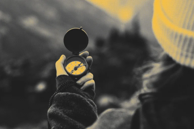 Woman holding a compass