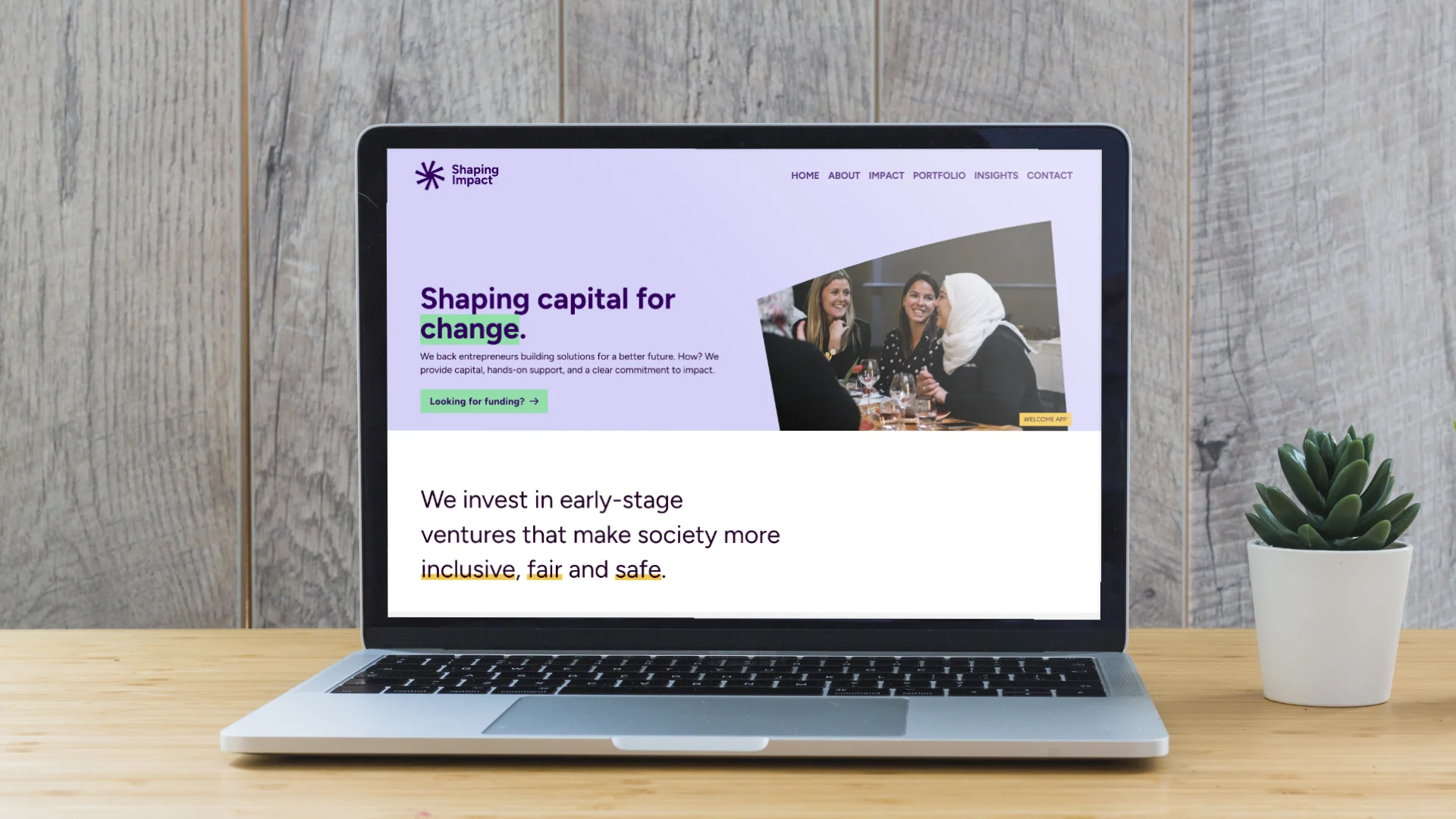 Shaping Impact website laptop mock-up